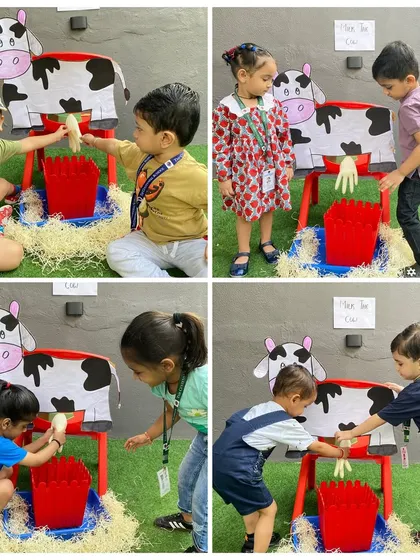 Teamwork makes the dream work, even when milking a cow. This activity not only teaches children about farm life but also encourages cooperation and social skills.