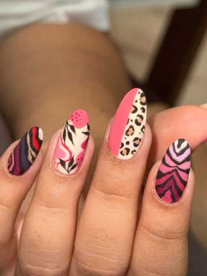 Close-up of this wild and pretty mixed-print set. The matte finish really makes the different patterns and colors pop.