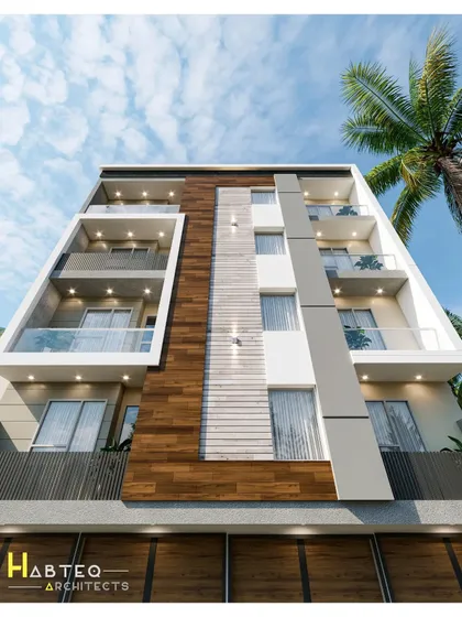 A low-angle day view of a recently proposed elevation for a 43-foot wide residential building. This perspective highlights the vertical design elements, including the interplay between wood, white, and grey sections.