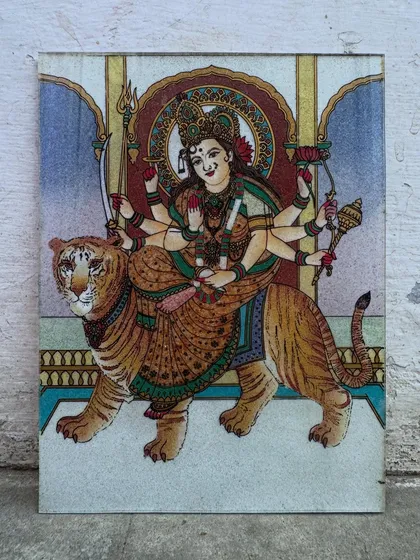 Here, the divine warrior Goddess Maa Durga is depicted riding her tiger, a symbol of immense strength and protection. I use vibrant gemstones to detail her form and weapons, creating an artwork that fills your home with courage and positive energy.