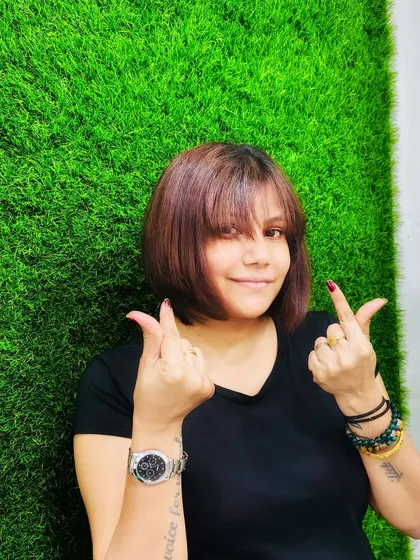 My personal style is heavily influenced by Korean trends, like this classic bob with soft bangs. This image connects with my audience on a personal level and showcases my authentic engagement with the K-beauty and K-fashion scene.