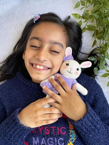 A lovely bunny in a purple dress with a custom initial "Q" on it. I made a similar one for my own daughter's birthday, and she absolutely adores it!