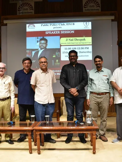A group photo with the faculty and organizers from the Public Policy Club at IIM Bangalore after my session.