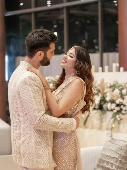 A romantic portrait of the couple embracing after their engagement. Their smiles and close embrace show their deep connection.