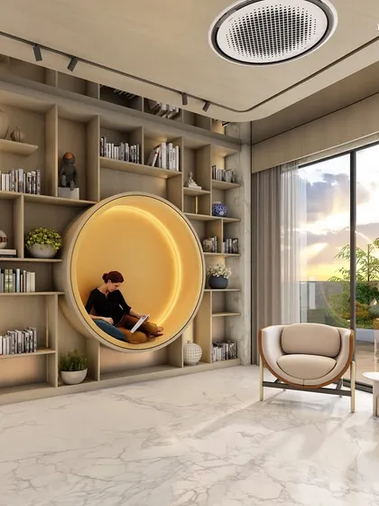 Another view of the library, showcasing the comfortable, modern furniture and large windows that flood the space with natural light. This clubhouse is not just a retreat but a statement of lavish living and distinguished tastes.