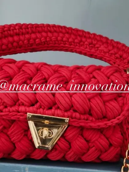 Meet the crochet puff bag. I make these using chunky T-shirt yarn for a bold, statement look. The gold-tone chain and hardware add a touch of elegance, making it a perfect companion for any outfit.