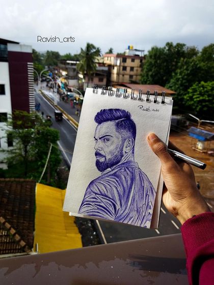 Another ballpoint pen tribute to King Kohli on his birthday, holding the sketch up against the backdrop of my town.