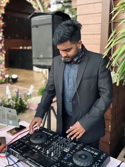 Dressed for a formal event. I can tailor my presence and music for more formal occasions like receptions or upscale private parties, ensuring a classy yet fun atmosphere.