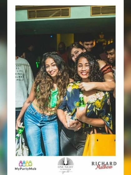 Friends enjoying a drink and the music. The vibe is always right for a fun, social evening.