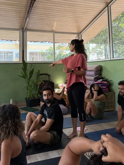 A typical workshop moment where we pause for discussion and questions. We believe in interactive learning, ensuring every teacher-in-training feels seen, heard, and fully understands the principles we're exploring together on the mat.