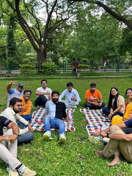 The group relaxing on picnic blankets at Cubbon Park. A perfect Sunday afternoon.