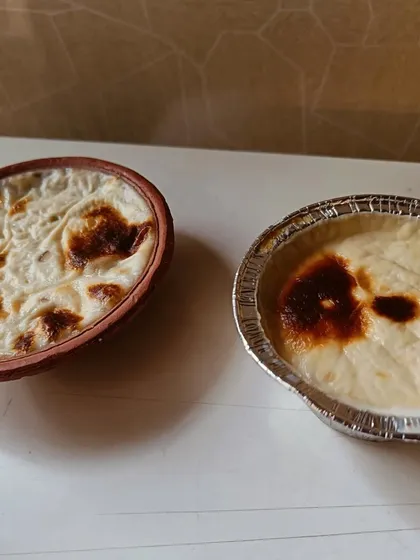 My Baked Phirni, served in both a traditional clay pot and a modern foil container. The flavour is what matters, no matter how it's served.