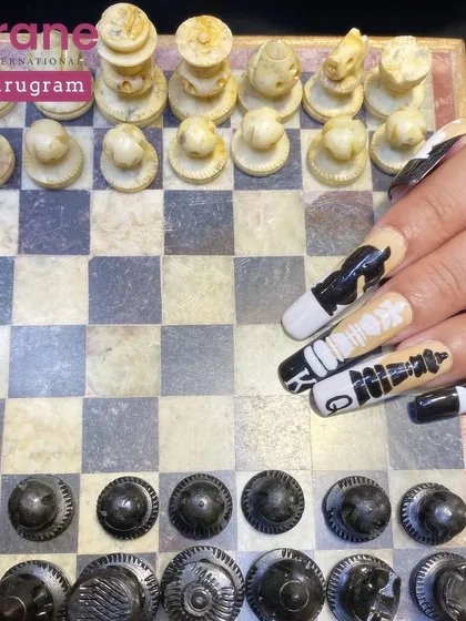 Another shot of the chess nails, showing the detail of the hand painted pieces.