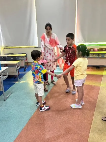 During our summer camp, young students engage in collaborative play. Activities like these are designed to enhance confidence, articulation, and social skills in a fun-filled setting.