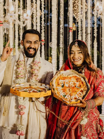 Because why not? After all the beautiful rituals, a "Just Married" pizza was the perfect, quirky celebration for Anuj and Abhisha. I love when couples bring their unique personalities into their day.