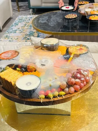 A lavish charcuterie and cheese platter ready for a house party. We bring the same level of detail and quality to intimate gatherings as we do to grand weddings.