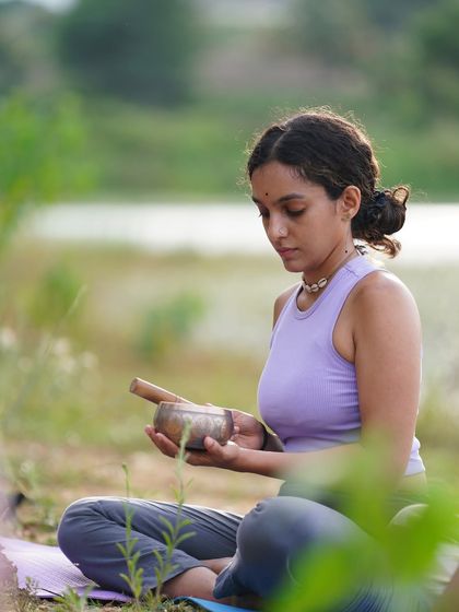 A moment of quiet contemplation with my singing bowl during a wellness retreat. Practicing outdoors allows us to connect with the healing energies of nature, amplifying the restorative effects of the sound bath.