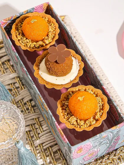A closer look at our Mithai Tartlets, showing the intricate details and modern presentation.