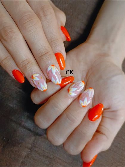 A full view of the hand-painted orange floral set.