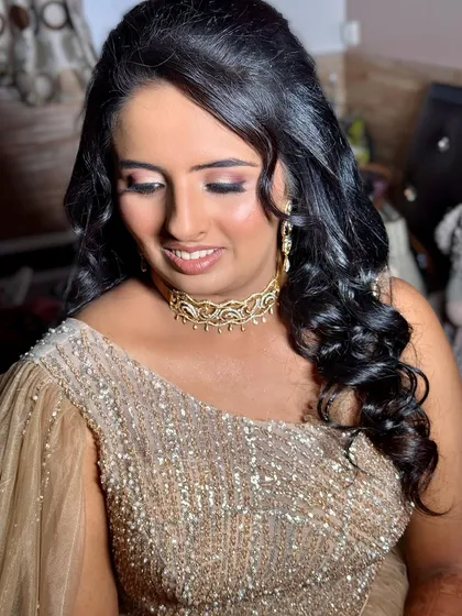 Another beautiful angle of this soft glam look. The shimmer on the eyes catches the light beautifully, adding a touch of magic.