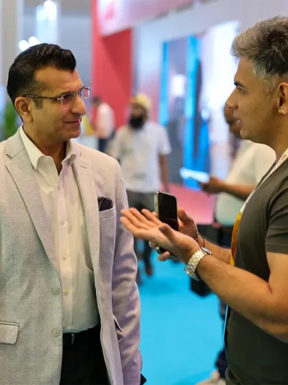 Two industry leaders connect on the expo floor. We cultivate an environment where top-level executives can network and discuss strategic partnerships.