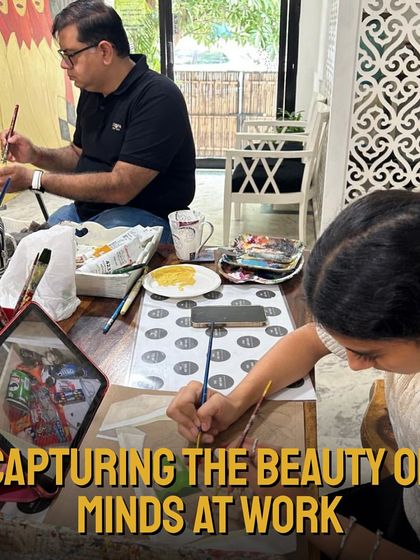 I love capturing the beauty of minds at work. Here, students of different ages are focused on their paintings, using tablets and traditional methods to bring their visions to life.