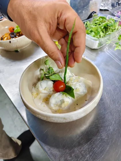 One final touch before the magic happens. A delicate garnish can elevate a dish from great to extraordinary.