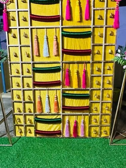 A full frontal view of the 'Bangla' setup on an artificial grass mat, ready for the evening's festivities.