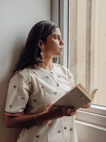 Lifestyle apparel photography is about capturing a mood. This image for a homegrown clothing brand uses natural light and a thoughtful pose to create a quiet, intimate story around the garment.