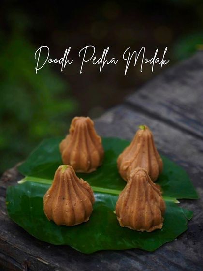Our Doodh Pedha Modak is a creamy, melt-in-your-mouth delight. It combines the classic taste of peda with the traditional shape of a modak.