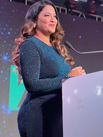 Another angle from the Waaree podium, capturing my professional speaking posture.