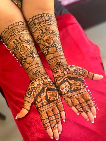A view of both hands together, showing the complete bridal design.