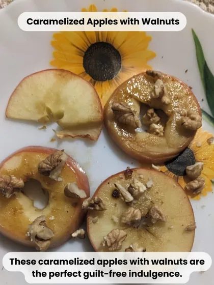A perfect guilt-free indulgence: caramelized apples with walnuts. Sliced apples are lightly pan-cooked with a touch of jaggery and topped with crunchy walnuts for a simple, healthy dessert.