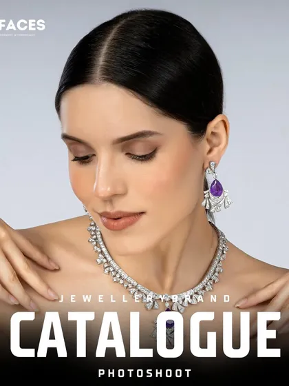 A dramatic shot of a model showcasing a statement diamond and amethyst necklace. The pose and lighting create a sense of luxury and high fashion.