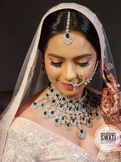 A close-up of bride Kshitija's North Indian wedding look. My artist Swati created this soft glam makeup with beautiful lashes and sparkling diamond jewellery.