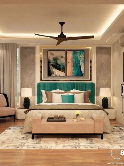 A bedroom design that balances comfort and style. The room features a teal headboard, a mix of neutral and pastel bedding, and a gallery wall, creating a personalized and chic retreat.