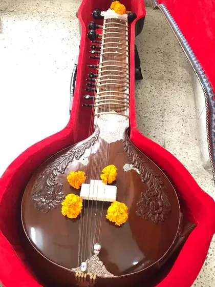 My sitar, adorned with flowers for the Vijayadashami pooja. This tradition is a beautiful reminder of the sacred bond between an artist and their instrument.