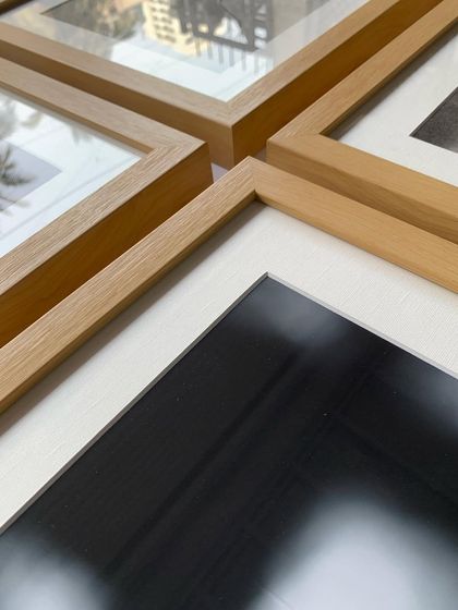 The light maple wood offers a beautiful contrast against both dark and light artworks, making it a popular choice for mixed media collections.