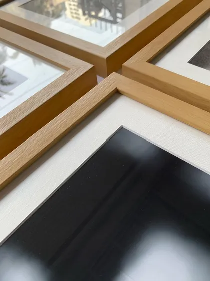 The light maple wood offers a beautiful contrast against both dark and light artworks, making it a popular choice for mixed media collections.