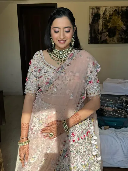 Ritu looking elegant and beautiful. The makeup is kept minimal and fresh, allowing her natural beauty to shine through.