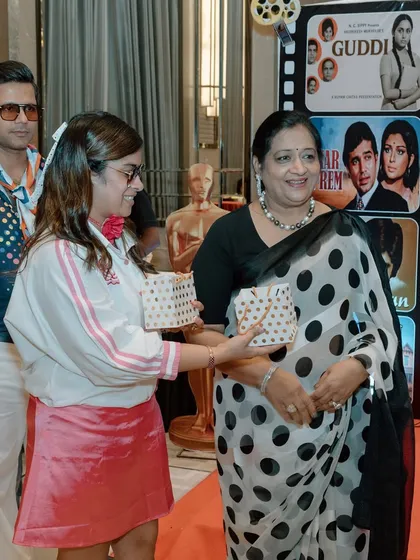Recognizing individuals is a key part of many milestone events. Here, a guest is being honored on stage. I can help structure awards segments for corporate galas to make them feel special and run smoothly.