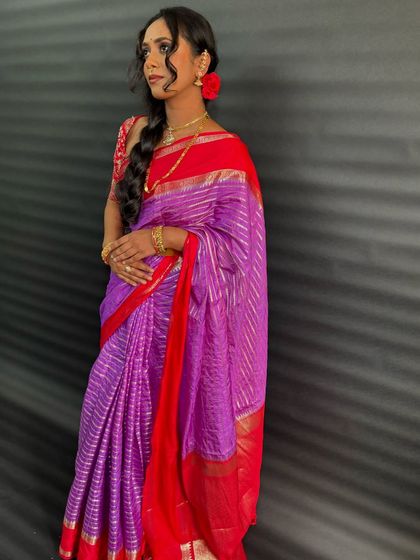 A client with a simple side braid and open waves, a pretty and traditional look.