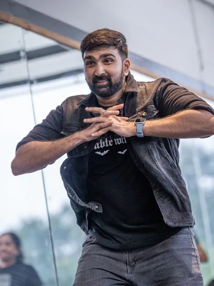 A student nailing the pose with focus and determination. Workshops are a great way to push your limits.