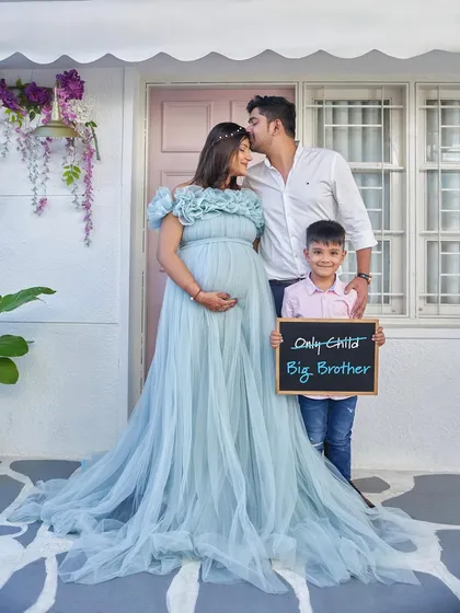 Celebrate your growing family with a photoshoot that includes everyone. Our flowing princess gowns are perfect for creating beautiful family portraits, complete with a "Big Brother" announcement.