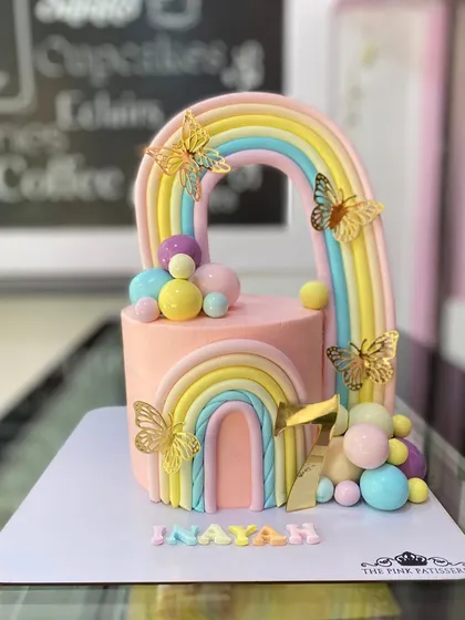 Another view of the beautiful pastel rainbow and butterfly cake.
