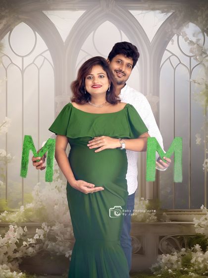 A creative couple's shot with a digitally enhanced background and 'MOM' props. This shows how I can blend classic poses with artistic elements for a unique look.