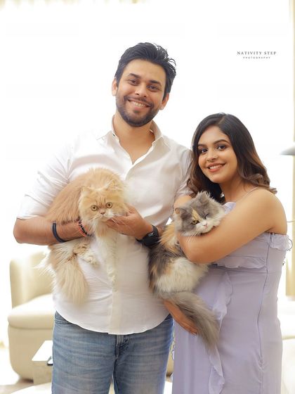 The whole family, including the feline members. We love incorporating pets into at-home sessions to capture your complete family unit.