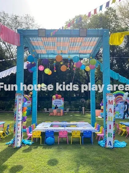 Another angle of the large outdoor festival-style party, showing how our rainbow furniture can be arranged to create different zones for dining and activities.
