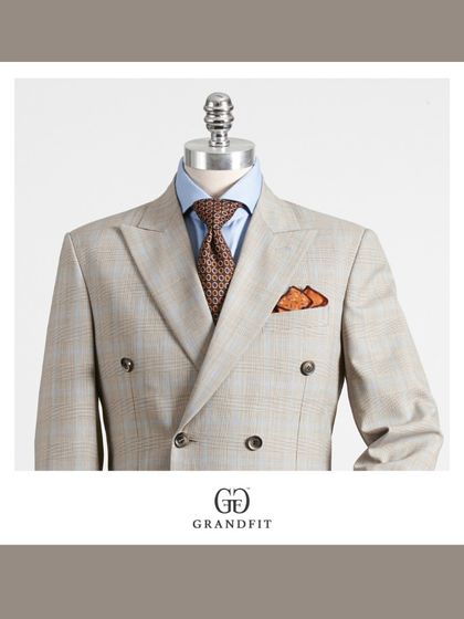 This light-colored plaid double-breasted jacket is perfect for making a refined statement at daytime events. The pattern is intricate, showcasing the quality of the fabric.