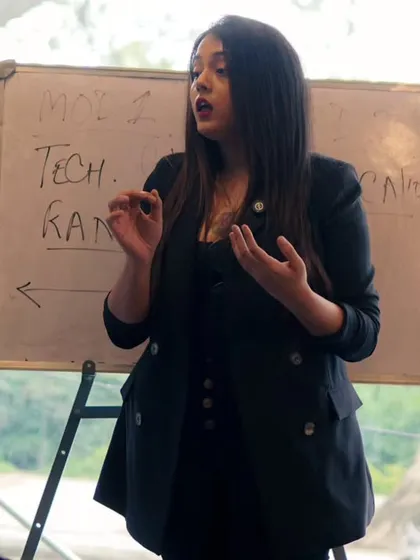 Another view of me teaching, emphasizing the connection between physical posture and vocal output.